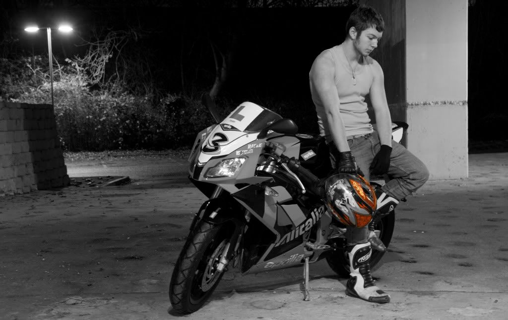 IMAGE: http://i133.photobucket.com/albums/q77/Road_Rebel/IMG_2922-BW-RedHelmet.jpg