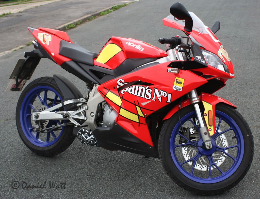 IMAGE: http://i133.photobucket.com/albums/q77/Road_Rebel/SideWM.jpg